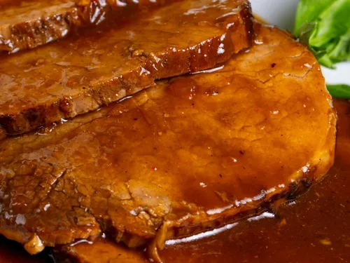 Rôti de porc et sa sauce caramélisée
