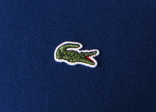 Histoire logo outlet lacoste