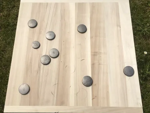 CONCOURS DE PALETS SUR PLANCHE EN BOIS