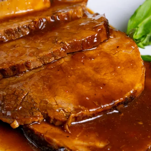 Rôti de porc et sa sauce caramélisée
